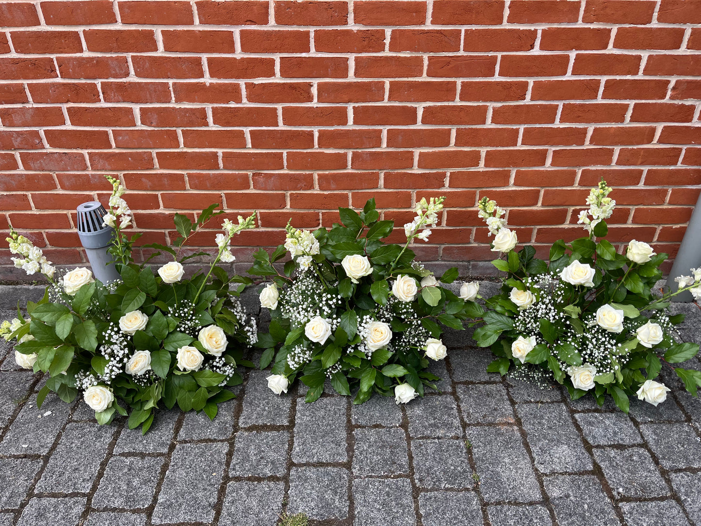 White Roses and Foliages Floral Arrangement